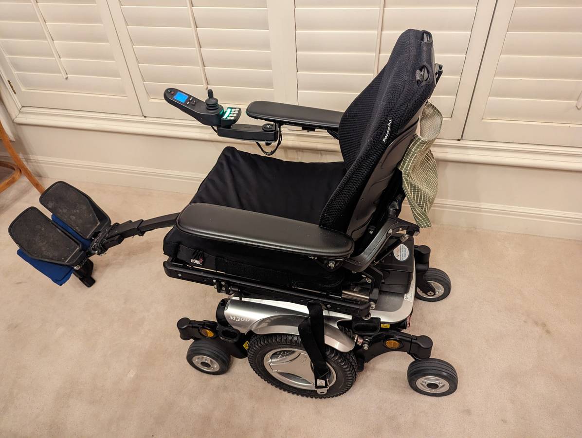 Electric permobil wheelchair scooter