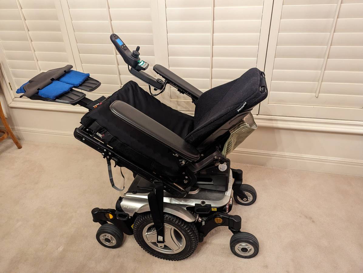 Electric permobil wheelchair scooter