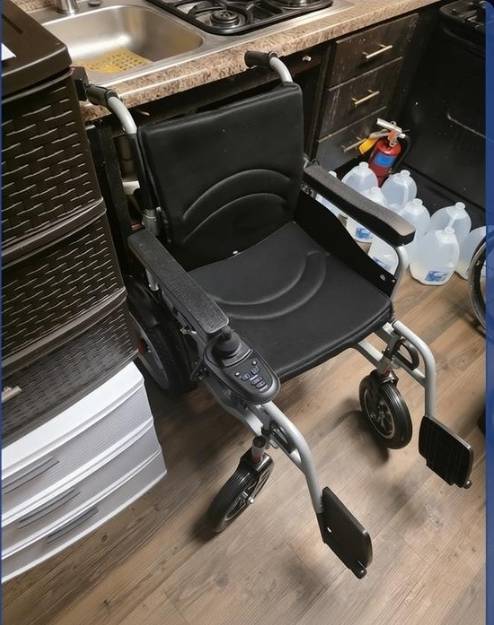Motorized electric foldable wheelchair